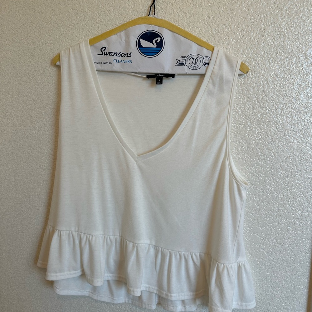 Lulu's White V-Neck Ruffle Hem Tank Top